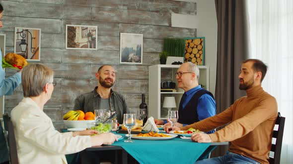 Beautiful Woman Arriving with Tasty Roasted Chicken alt