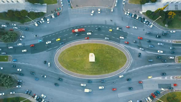 Traffic On Busy Roundabout In Rome Italy At Daytime  Aerial Topdown Static Shot alt