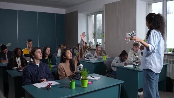 Multinational Pupils Studying in Chemistry Lesson alt