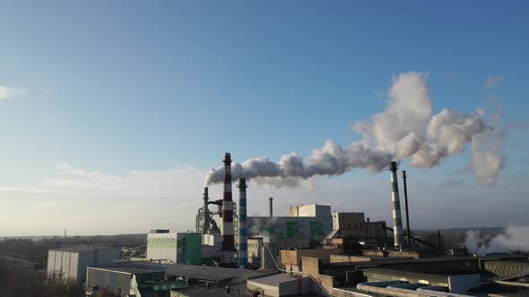 panorama of the factory with smoke coming from the pipes