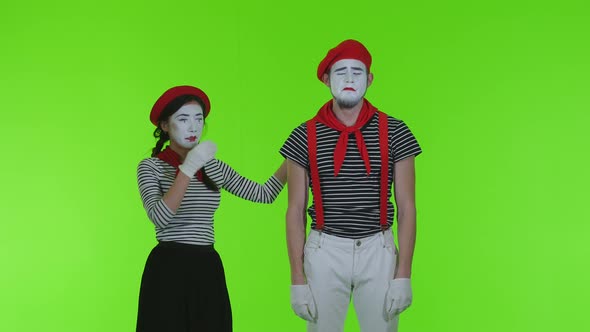 Frustrated Mimes Cry On A Green Background