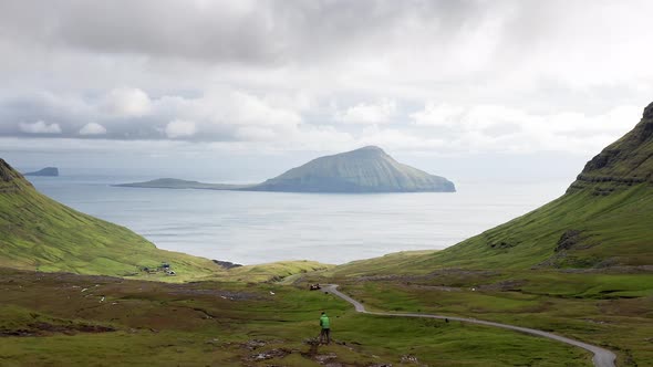 Aerial View of Wilderness Natureislands Ocean Green Mountain and Rock Cliffs alt