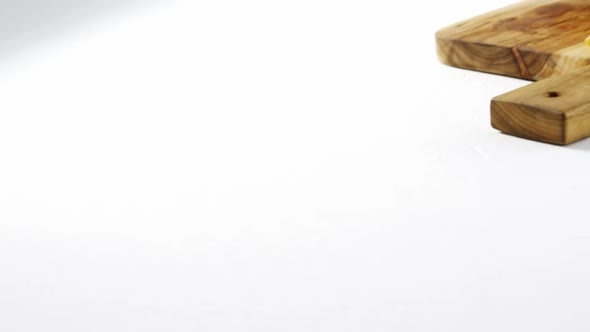 Snacks with dip on chopping board alt