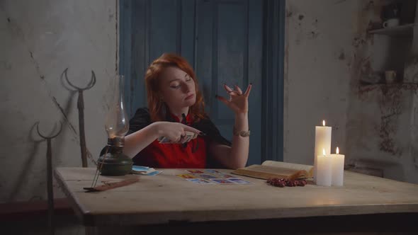 Soothsayer Practicing Divination with Tarot Cards alt