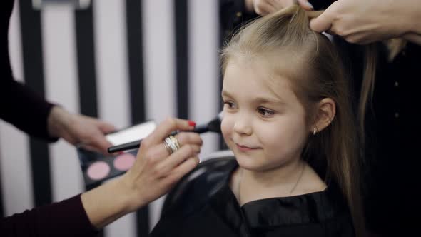 The Work of a Hairdresser and Makeup Artist in the Beauty Salon alt