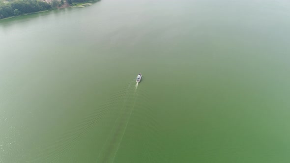 Aerial of a boat on water alt
