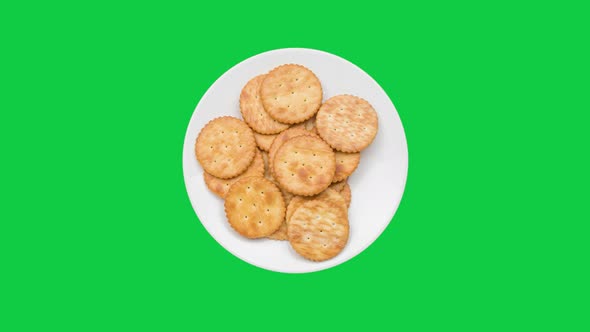 Stop motion animation Biscuits Cookies in a bowl on chroma key green