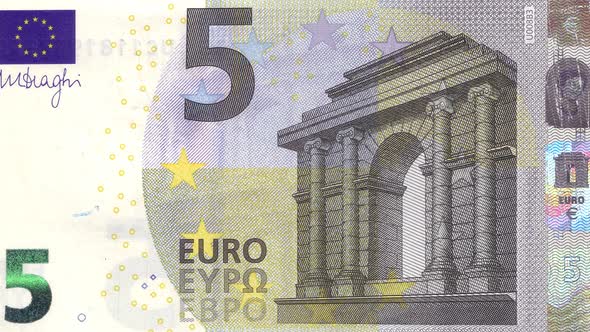5 euro close-up motion background. Five euro cash money macro view