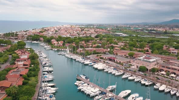 Aerial View on White Sailing Yachts at Portorosa, Furnari, Italy. Mediterranean Sea, Mountains and alt