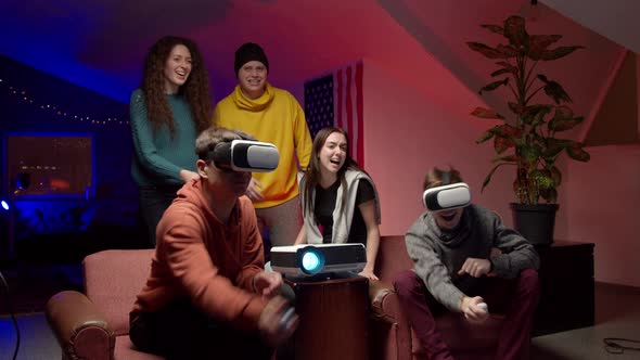 Group of Young Friends Playing Virtual Videogame