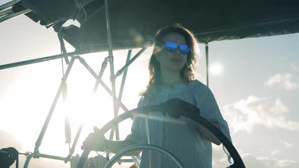 Woman on a Sailing Boat Yacht During Summer Travel alt