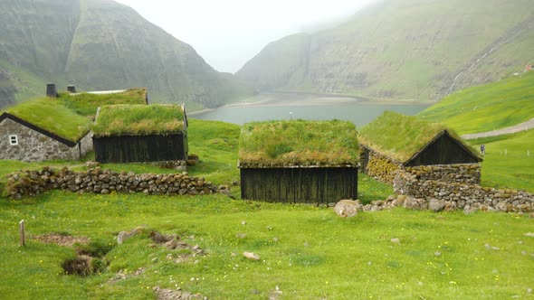 Old Faroese House with Grass Rooftop in the Middle of Mist Nature alt
