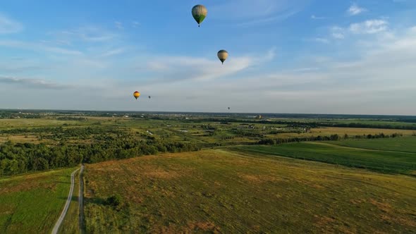 Aerostats travel in the air in summer alt