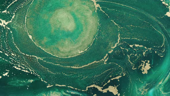 Abstract Explosion of Green Paints Gold Sparkles Closeup alt