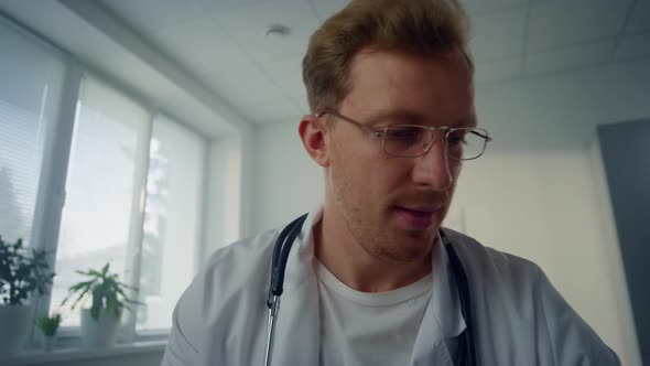 Pov Video Physician Completing Patient Examination in Clinic alt