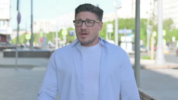 Portrait of Sleepy Man Yawning Outdoor alt