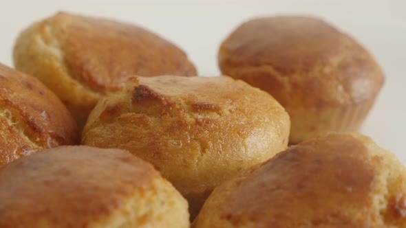 Shallow DOF cornbread prepared as a muffin slow tilt 4K 2160p 30fps UltraHD footage - Tasty cornmeal alt