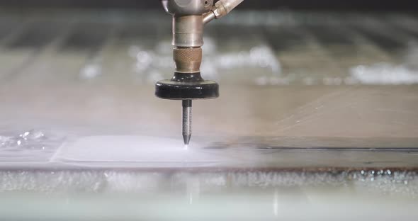 Closeup Shot of Waterjet Metal Cutting