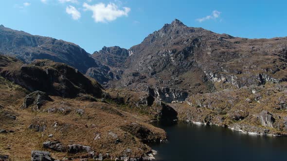 4k aerial drone footage over the 5th lagoon of Pichgacocha from Ambo, Huanuco, Peru in the Andes mou alt