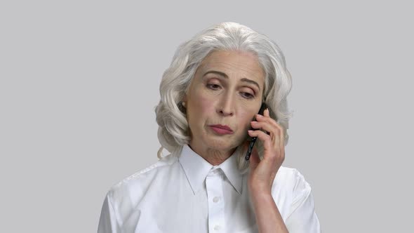 Close Up Portrait Old Lady Having Phone Conversation alt