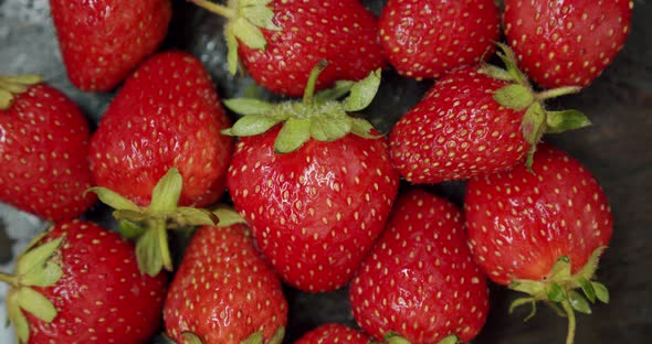 Fresh Strawberries, Rotating Slowly. Close Up. Top View alt