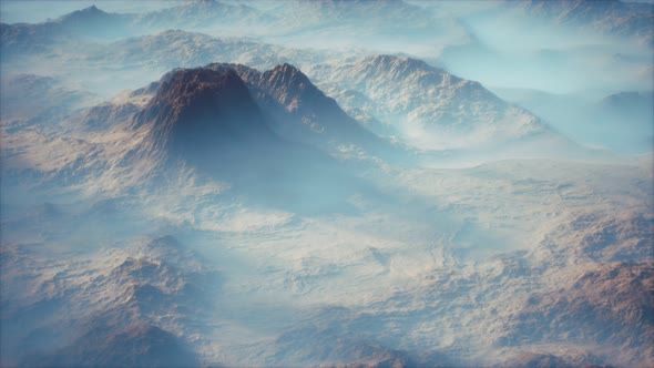 Distant Mountain Range and Thin Layer of Fog on the Valleys alt