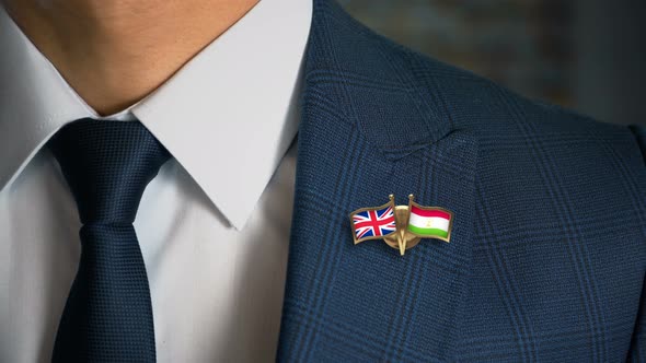 Businessman Friend Flags Pin United Kingdom Tajikistan alt