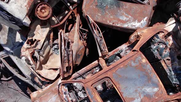 Vertical Video of Wardestroyed Cars in Irpin Ukraine alt