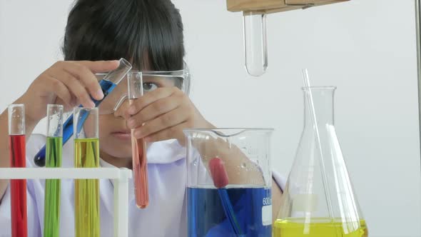 Children play and learn chemical in laboratory