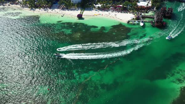 Speedboats Moving in Azure Green Carebbean Sea in Cancun City