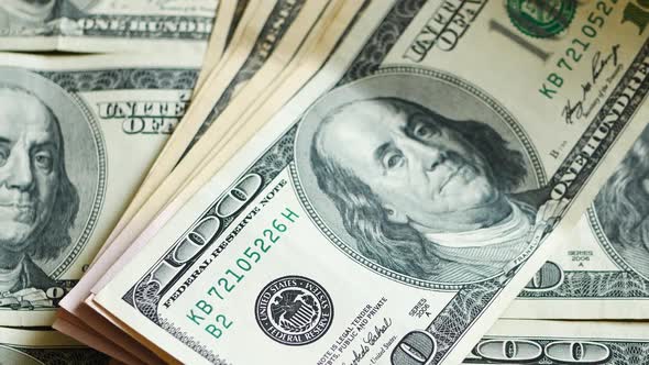 Stack of hundred dollars bills