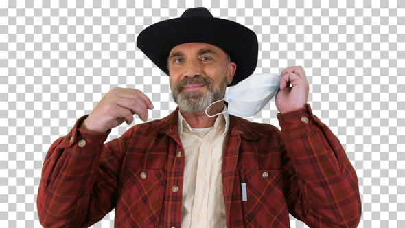 Farmer taking off medical mask and taking, Alpha Channel alt