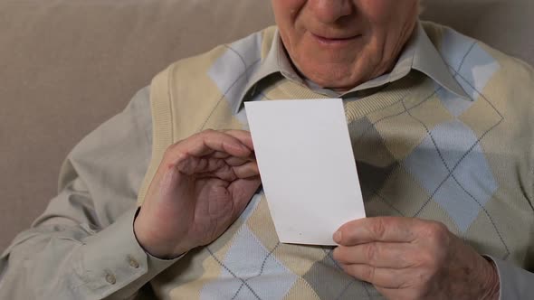 Sad Retired Man Looking Photo Crying, Widowed Pensioner Feeling Lonely, Sorrow alt