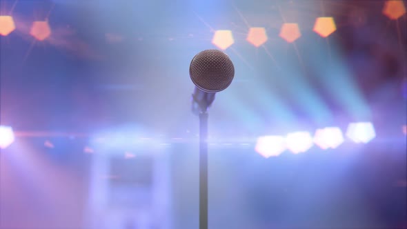 Microphone on the Stage in the Concert Hall Against the Shining Stage ...