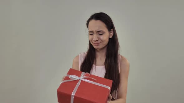 Female Holding Present alt