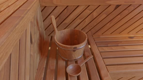 Wooden Finnish sauna accessories. Water bucket with a wooden ladle in a bathroom alt