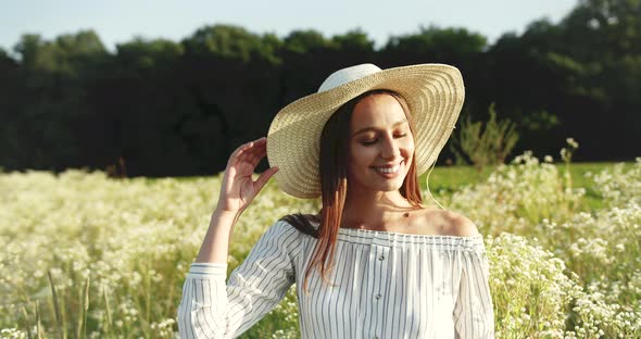 Portrait of Happy Woman With Flowers