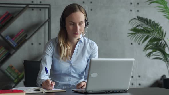 Excited Business Woman Celebrates Success in the Workplace alt