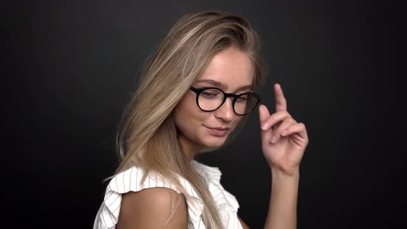 Blond Woman Posing In Glasses