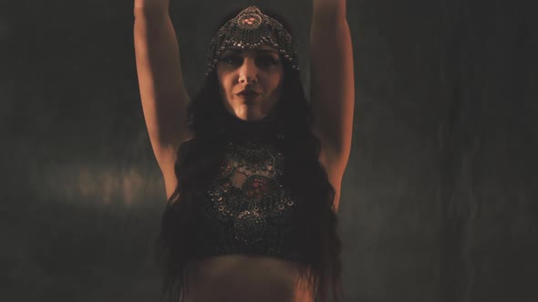 Sensual Woman Dancing in Light and Shadow alt