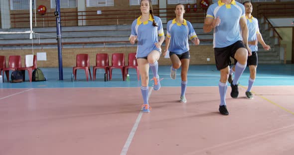 Volleyball players exercising in the court 4k alt