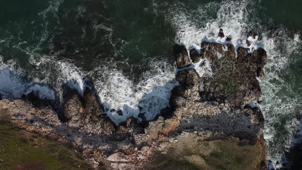 Aerial View of Sea Waves and Fantastic Cliffs Rocky Coast alt