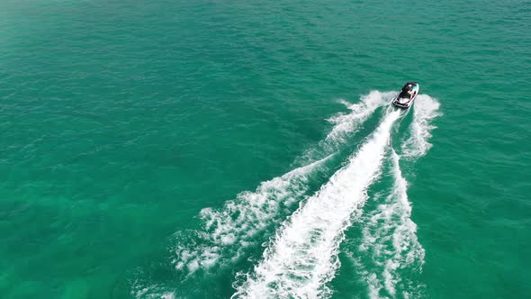 AH - Jetski in Tropical Ocean and Beautiful Island 02 alt
