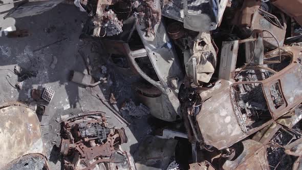 Vertical Video of a Dump of Destroyed Cars During the War in Ukraine alt