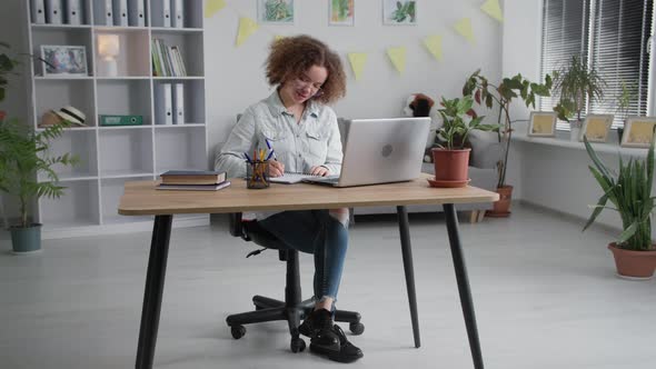 Modern Education Pretty Adult Girl with Pen in Hands and Glasses for Sight Talking to Teacher By alt