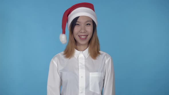 Beautiful Korean Female Christmas Time Shows Sign Hi alt