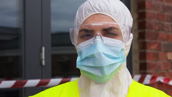 Healthcare Worker in Protective Gear Outdoors alt