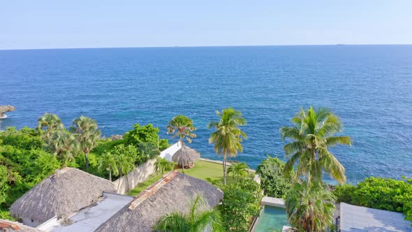 Luxury seafront resort at Costa Verde in Dominican Republic. Aerial forward alt