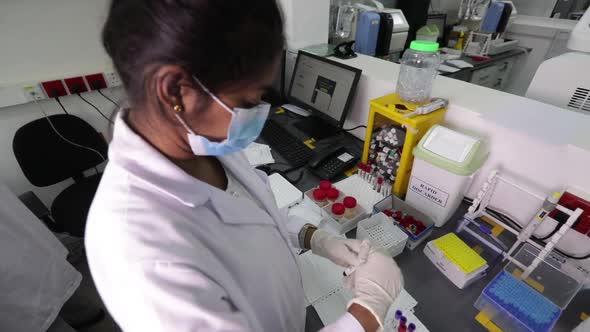 Indian Scientist Blood Testing Testubes 2