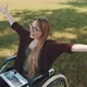 Happy Young Disabled Caucasian Woman in the Wheelchair Resting in the Nature with Laptop and - VideoHive Item for Sale